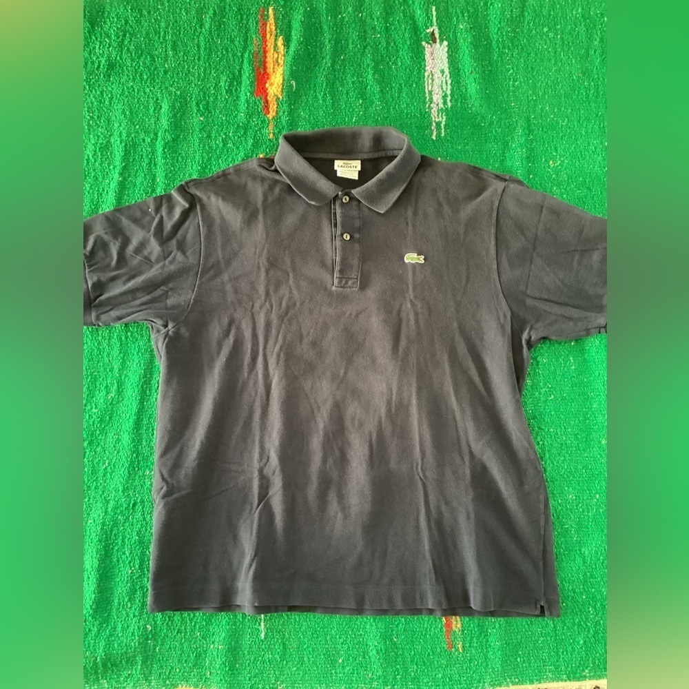 Lacoste Blue Polo Shirt-SZ 7 (XL)
Pit to pit 23”
Length 26”
F3